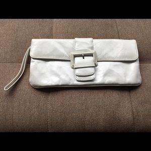 White Hobo International clutch, lavender interior